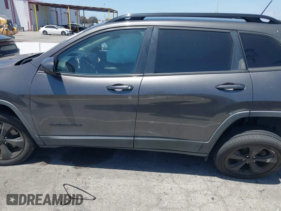 2018 Jeep Cherokee Latitude with VIN 1C4PJLCB8JD528079, listed as a IAAI auction lot 42261691 with 63,827 mi miles and . Bid and sale history available at DreamBid. Image 13.