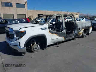2023 GMC Sierra 1500 with VIN 1GTUUBE83PZ170052, listed as a IAAI auction lot 40598815 with Not Provided miles and . Bid and sale history available at DreamBid. Image 2.