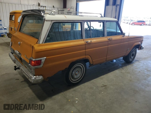 1972 Jeep Grand Wagoneer with VIN J2A144CN29869, listed as a Copart auction lot 73240394 with 83,806 mi miles and Clean title. Bid and sale history available at DreamBid. Image 3.