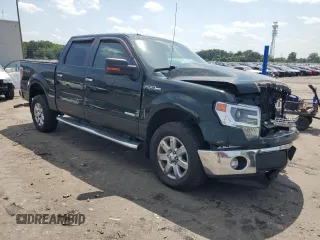 2014 Ford F-150 XL with VIN 1FTFW1ET3EKG39910, listed as a Copart auction lot 61995165 with 139,067 mi miles and Salvage title. Bid and sale history available at DreamBid. Image 4.
