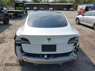 2021 Tesla Model 3 Standard Range Plus z VIN 5YJ3E1EA9MF027985, wystawiony jako IAAI lot #42045254 z przebiegiem 42 353 mil mil oraz . Historia ofert i sprzedaży dostępna na DreamBid. Obrazek 16.