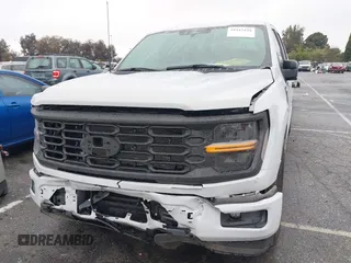 2024 Ford F-150 STX with VIN 1FTEW2KP7RFA29709, listed as a IAAI auction lot 41915128 with 5,883 mi miles and . Bid and sale history available at carsss.com. Image 6.