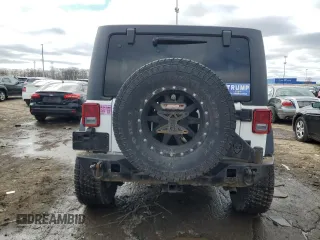 2017 Jeep Wrangler Unlimited Rubicon z VIN 1C4BJWFG5HL511601, wystawiony jako Copart lot #48223945 z przebiegiem 86 465 mil mil oraz Szkoda całkowita • Salvage title. Historia ofert i sprzedaży dostępna na DreamBid. Obrazek 6.