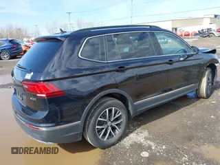 2020 Volkswagen Tiguan SE with VIN 3VV2B7AX5LM091857, listed as a IAAI auction lot 41922727 with 83,464 mi miles and . Bid and sale history available at DreamBid. Image 4.