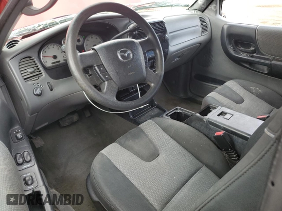 2005 Mazda B-Series Truck z VIN 4F4YR46U55PM04234, wystawiony jako Copart lot #58062805 z przebiegiem 162 683 mil mil oraz Szkoda całkowita • Salvage title. Historia ofert i sprzedaży dostępna na DreamBid. Obrazek 8.