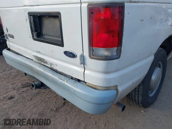 1999 Ford Econoline Cargo Commercial with VIN 1FTNE24L3XHB84868, listed as a IAAI auction lot 41151145 with 450,651 mi miles and . Bid and sale history available at carsss.com. Image 14.