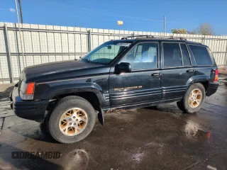 1998 Jeep Grand Cherokee Limited with VIN 1J4GZ78YXWC145281, listed as a Copart auction lot 53365635 with 242,224 mi miles and Salvage title. Bid and sale history available at DreamBid. Image 1.