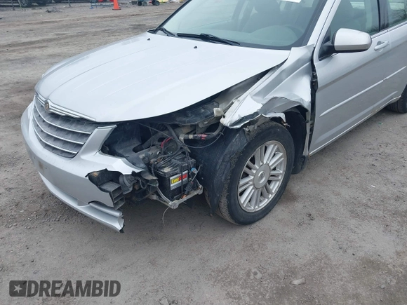 2007 Chrysler Sebring Touring z VIN 1C3LC56K27N567578, wystawiony jako IAAI lot #41507319 z przebiegiem 181 390 mil mil oraz . Historia ofert i sprzedaży dostępna na DreamBid. Obrazek 6.