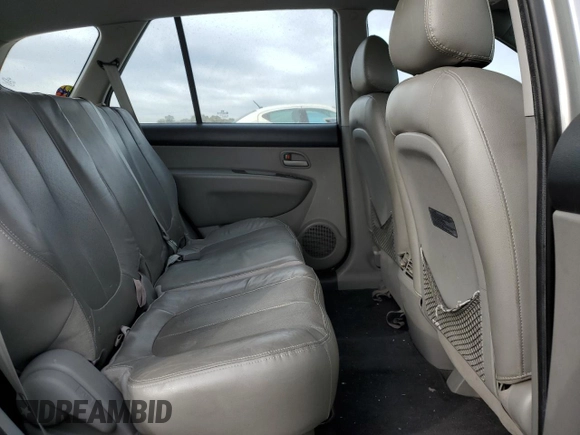 2009 Kia Rondo LX Base with VIN KNAFG528097222268, listed as a Copart auction lot 77797124 with 184,569 mi miles and Salvage Title. Bid and sale history available at carsss.com. Image 11.