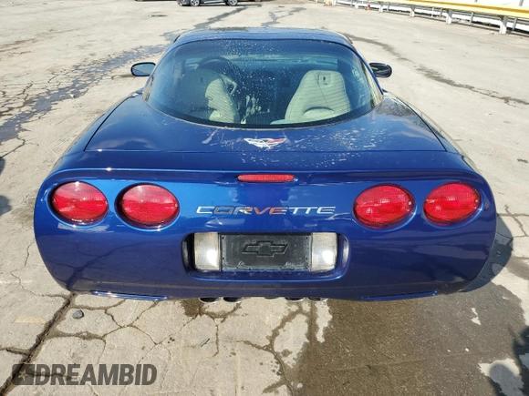 2004 Chevrolet Corvette with VIN 1G1YY22G145132963, listed as a Copart auction lot 74264184 with 74,077 mi miles and Salvage Title. Bid and sale history available at carsss.com. Image 6.