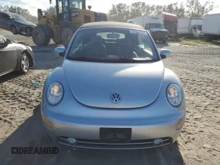 2004 Volkswagen Beetle with VIN 3VWCM21Y34M300701, listed as a Copart auction lot 77567344 with 91,236 mi miles and Salvage Title. Bid and sale history available at DreamBid. Image 5.
