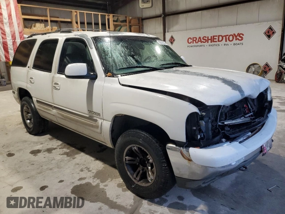 2000 GMC Yukon SLT with VIN 1GKEC13T9YJ159294, listed as a Copart auction lot 82626544 with 0 mi miles and Salvage Title. Bid and sale history available at carsss.com. Image 4.