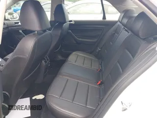 2010 Volkswagen Jetta Wolfsburg Edition with VIN 3VWRJ7AJ1AM152563, listed as a IAAI auction lot 42500824 with 165,125 mi miles and . Bid and sale history available at DreamBid. Image 8.