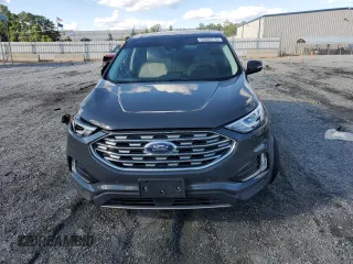 2021 Ford Edge Titanium z VIN 2FMPK3K96MBA54764, wystawiony jako Copart lot #55593715 z przebiegiem 49 729 mil mil oraz Szkoda całkowita • Salvage title. Historia ofert i sprzedaży dostępna na DreamBid. Obrazek 5.