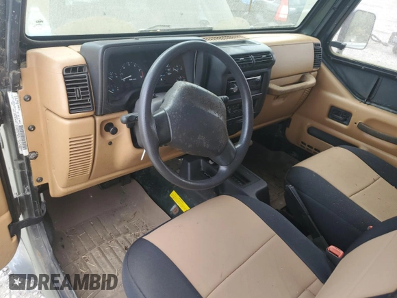 1998 Jeep Wrangler SE with VIN 1J4FY29P8WP784825, listed as a Copart auction lot 61581205 with 148,152 mi miles and Clean title. Bid and sale history available at DreamBid. Image 8.
