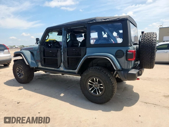 2024 Jeep Wrangler Rubicon X with VIN 1C4RJXFGXRW247781, listed as a Copart auction lot 64393745 with 2,661 mi miles and Salvage title. Bid and sale history available at DreamBid. Image 2.