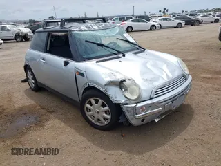 2004 MINI Hardtop with VIN WMWRC33434TJ57506, listed as a IAAI auction lot 42117581 with 148,483 mi miles and . Bid and sale history available at DreamBid. Image 1.