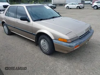 1986 Honda Accord z VIN 1HGBA7433GA101266, wystawiony jako IAAI lot #42276345 z przebiegiem 133 970 mil mil oraz . Historia ofert i sprzedaży dostępna na DreamBid. Obrazek 1.