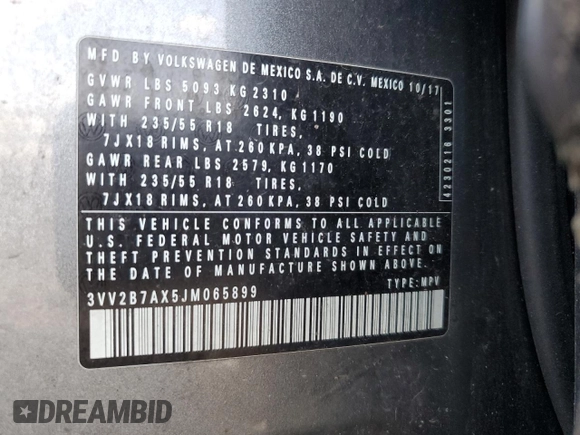 2018 Volkswagen Tiguan SEL z VIN 3VV2B7AX5JM065899, wystawiony jako Copart lot #65825635 z przebiegiem 115 677 mil mil oraz Szkoda całkowita • Salvage title. Historia ofert i sprzedaży dostępna na DreamBid. Obrazek 13.