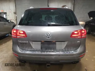 2013 Volkswagen Touareg Lux with VIN WVGEF9BP6DD002607, listed as a Copart auction lot 83420704 with 143,571 mi miles and Salvage Title. Bid and sale history available at DreamBid. Image 6.