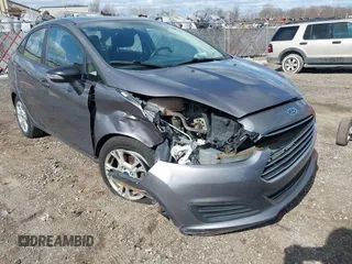 2014 Ford Fiesta SE with VIN 3FADP4BJ1EM199936, listed as a IAAI auction lot 41988670 with 44,846 mi miles and . Bid and sale history available at DreamBid. Image 6.
