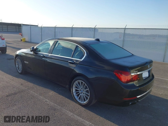 2013 BMW 7 Series 750Li xDrive with VIN WBAYF8C53DD140448, listed as a IAAI auction lot 41933840 with 119,013 mi miles. Bid and sale history available at carsss.com. Image 3.