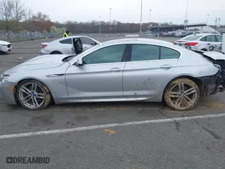 2013 BMW 6 Series 650i xDrive with VIN WBA6B4C53DD098486, listed as a IAAI auction lot 42038491 with 97,771 mi miles. Bid and sale history available at carsss.com. Image 14.