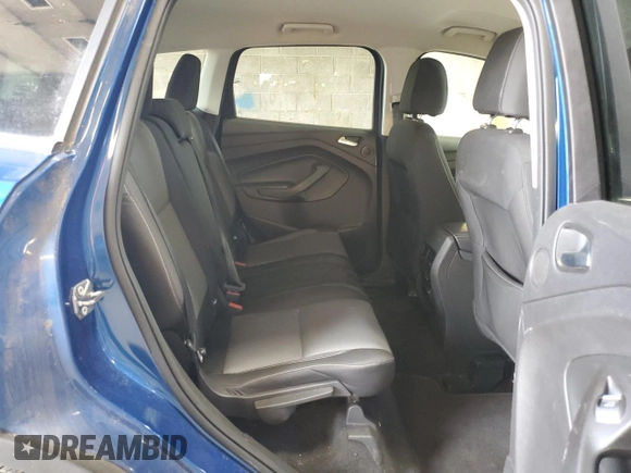 2017 Ford Escape SE z VIN 1FMCU9GD4HUD17066, wystawiony jako Copart lot #60504105 z przebiegiem 64 570 mil mil oraz Szkoda całkowita • Salvage title. Historia ofert i sprzedaży dostępna na DreamBid. Obrazek 11.