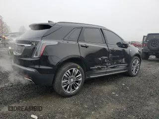 2020 Cadillac XT5 Sport AWD with VIN 1GYKNGRS5LZ232546, listed as a Copart auction lot 84104644 with 25,276 mi miles and Salvage title. Bid and sale history available at DreamBid. Image 3.