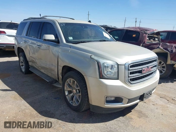 2015 GMC Yukon SLT with VIN 1GKS1BKC1FR145694, listed as a IAAI auction lot 41851644 with 162,592 mi miles. Bid and sale history available at carsss.com. Image 1.