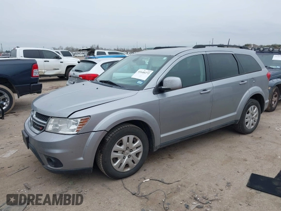 2019 Dodge Journey SE with VIN 3C4PDCBB0KT816103, listed as a IAAI auction lot 41640272 with 118,310 mi miles and . Bid and sale history available at DreamBid. Image 17.