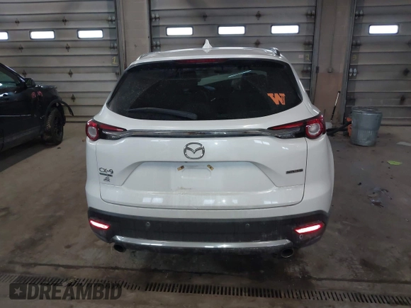 2021 Mazda CX-9 Signature with VIN JM3TCBEY3M0509978, listed as a IAAI auction lot 41690773 with 65,418 mi miles. Bid and sale history available at carsss.com. Image 16.