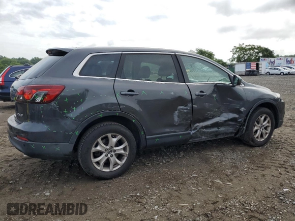 2015 Mazda CX-9 Touring z VIN JM3TB2CA2F0452202, wystawiony jako Copart lot #60407215 z przebiegiem 158 373 mil mil oraz Szkoda całkowita • Salvage title. Historia ofert i sprzedaży dostępna na DreamBid. Obrazek 3.