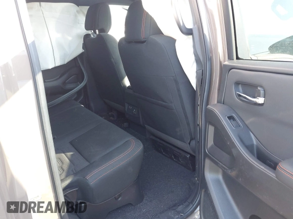 2024 Nissan Frontier Pro-4X with VIN 1N6ED1EK0RN645979, listed as a IAAI auction lot 41613465 with 19,241 mi miles and . Bid and sale history available at DreamBid. Image 8.