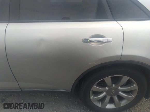 2005 Infiniti FX z VIN JNRAS08W05X203234, wystawiony jako IAAI lot #42375603 z przebiegiem Nie podano mil oraz . Historia ofert i sprzedaży dostępna na DreamBid. Obrazek 6.