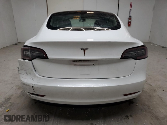 2023 Tesla Model 3 z VIN 5YJ3E1EA2PF439119, wystawiony jako Copart lot #60708065 z przebiegiem 48 717 mil mil oraz Nie do naprawy • Non repairable. Historia ofert i sprzedaży dostępna na DreamBid. Obrazek 6.