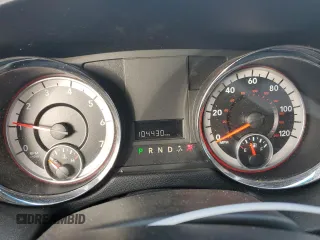 2014 Dodge Grand Caravan SE 30th Anniversary with VIN 2C4RDGBG8ER180968, listed as a Copart auction lot 49465325 with 104,430 mi miles and Salvage Title. Bid and sale history available at DreamBid. Image 9.