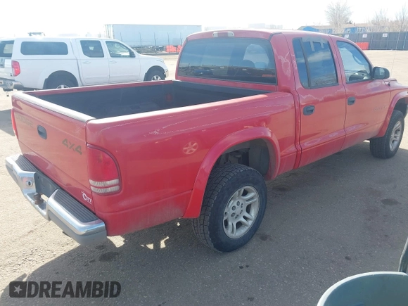 2002 Dodge Dakota SLT z VIN 1B7HG48N32S518455, wystawiony jako IAAI lot #41652316 z przebiegiem 234 856 mil mil oraz . Historia ofert i sprzedaży dostępna na DreamBid. Obrazek 4.