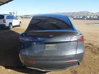 2022 Tesla Model Y Long Range with VIN 7SAYGDEE2NA017434, listed as a IAAI auction lot 41842025 with 35,164 mi miles and . Bid and sale history available at DreamBid. Image 16.