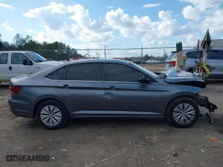 2019 Volkswagen Jetta S with VIN 3VWC57BU1KM219974, listed as a IAAI auction lot 41510105 with 153,989 mi miles. Bid and sale history available at carsss.com. Image 13.