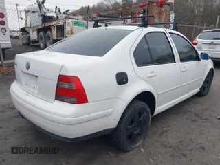 2000 Volkswagen Jetta z VIN 3VWSC29M4YM115496, wystawiony jako IAAI lot #41912780 z przebiegiem 200 439 mil mil oraz . Historia ofert i sprzedaży dostępna na DreamBid. Obrazek 4.