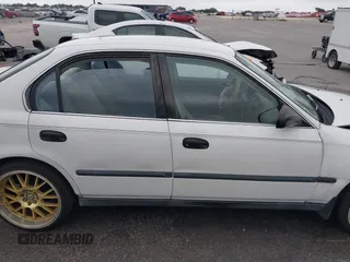 1997 Honda Civic LX z VIN 2HGEJ6676VH534795, wystawiony jako IAAI lot #42170378 z przebiegiem 228 033 mil mil oraz . Historia ofert i sprzedaży dostępna na DreamBid. Obrazek 14.