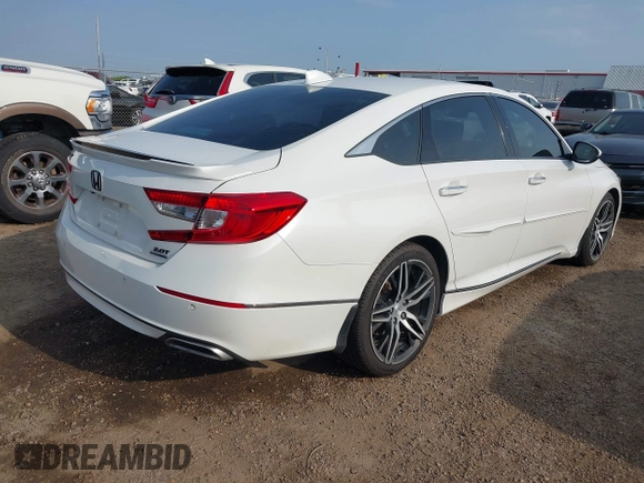 2021 Honda Accord Touring with VIN 1HGCV2F9XMA005191, listed as a IAAI auction lot 42088545 with 169,611 mi miles and . Bid and sale history available at DreamBid. Image 4.
