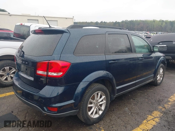2014 Dodge Journey SXT with VIN 3C4PDCBB4ET245932, listed as a IAAI auction lot 41857444 with 228,827 mi miles. Bid and sale history available at carsss.com. Image 4.