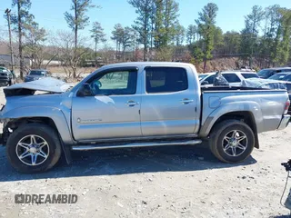 2014 Toyota Tacoma PreRunner with VIN 5TFJU4GNXEX061808, listed as a IAAI auction lot 41585931 with 214,240 mi miles. Bid and sale history available at carsss.com. Image 14.