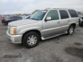 2004 Cadillac Escalade z VIN 1GYEC63T64R285823, wystawiony jako Copart lot #59167915 z przebiegiem 289 955 mil mil oraz Szkoda całkowita • Salvage title. Historia ofert i sprzedaży dostępna na DreamBid. Obrazek 1.