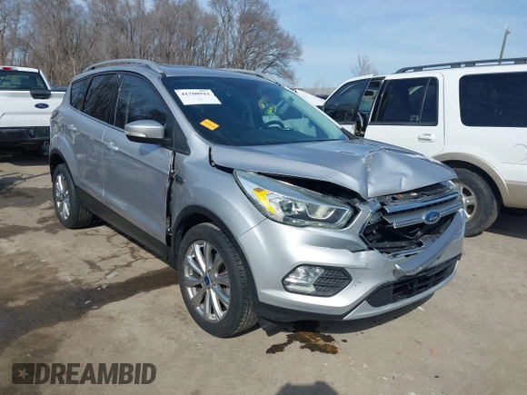 2017 Ford Escape Titanium with VIN 1FMCU0JD3HUB13234, listed as a IAAI auction lot 41760944 with 113,361 mi miles. Bid and sale history available at carsss.com. Image 1.