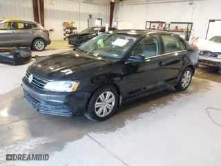 2017 Volkswagen Jetta 1.4T S with VIN 3VW167AJ5HM329706, listed as a IAAI auction lot 40801058 with 144,103 mi miles. Bid and sale history available at carsss.com. Image 18.