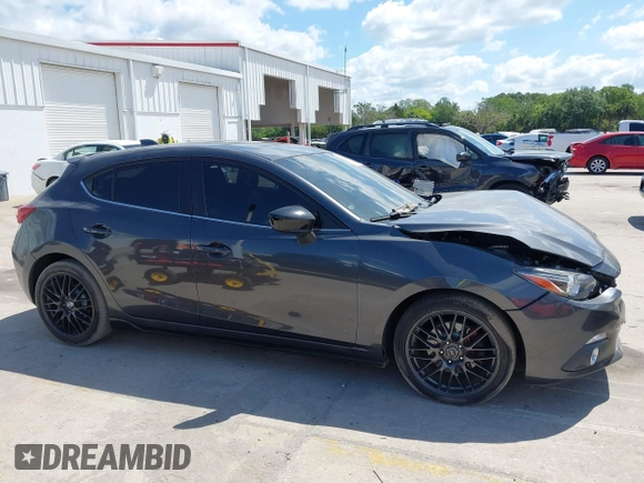 2015 Mazda 3 S Grand Touring with VIN JM1BM1M34F1258936, listed as a IAAI auction lot 42071464 with 100,933 mi miles and . Bid and sale history available at DreamBid. Image 13.