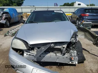 2005 Ford Focus S with VIN 1FAFP34N95W247489, listed as a Copart auction lot 60858415 with Not provided miles and Salvage title. Bid and sale history available at DreamBid. Image 5.